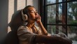 © ikhwan - Woman listening to music by window, practicing emotional self care