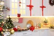 © New Africa - Beautiful Christmas decor on countertop in kitchen