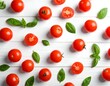 © jalangkote - Overhead view of ripe red tomatoes and green basil leaves on a white wood