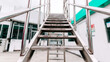 © Bonsales - Stainless steel stairway leading up, symbolizing progress and future growth in a corporate environment