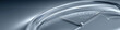 © sam richter - Curved glass clock face displays 2026 numerals amid metallic blue sheen.