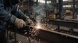 © Timbang - Welder working on metal structure in industrial setting.