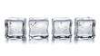 © Gusi - Four clear ice cubes on white.