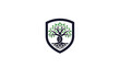 © M Susanto - A shield logo featuring a stylized tree with green leaves and roots