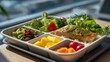 © forenna - A hospital meal tray designed with color-coded sections for dietary needs, emphasizing patient-centered care and thoughtful healthcare service design. cinematic color correction, natural uneven
