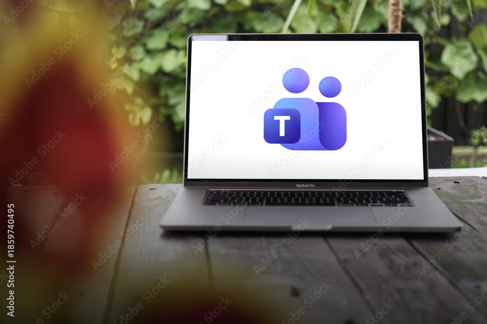 Microsoft Teams logo shown on a MacBook Pro screen, representing a