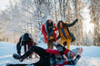 © Halfpoint - Group of friends enjoying winter time in snowy nature.