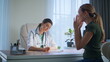 © stockbusters - Experienced doctor providing consultation in clinic closeup. Complaining patient