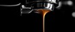 © Erwant - Close up of fresh espresso flowing from a coffee machine against black backdrop