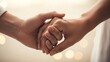 © Zariyan - Close-up of Two People's Hands Intertwined, Gentle Touch of Connection and Romance