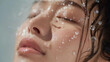 © sam richter - Water droplets cascading over radiant facial skin creating fresh hydrating beauty effect.