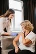 © dsheremeta - Nurse vaccinating senior woman preventing disease