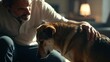 © Arifuzzaman - Man gently petting his loyal dog in a warm, dimly lit home interior