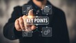 © Kazi - Businessman interacting with key points graphic interface