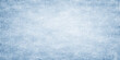 © Hena - A bright blue grunge abstract background features a frozen winter texture of white snow and icy frost patterns under a cold crystal sky with soft clouds