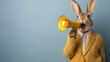 © Alina - Stylish rabbit shouting into yellow megaphone on blue background concept art