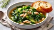 © kardaska - Hearty white bean and kale soup with bread