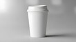 © Rahana  - Close up of white takeaway coffee cup mockup against blurred grey background