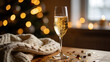 © you - dcf. A champagne flute with golden bubbles on a wooden table beside a cozy blanket and festive confetti. bar promotions, beverage menus, designed for food & beverage menus and cafe branding.