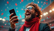 © miss irine - Man in glasses with red scarf holds smartphone. He laughs joyfully amidst falling red confetti. Crowd watches lights in stadium background. Excited person reacts to good news on device.
