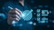© CuteBee - A person is visually demonstrating strategic goal setting and achievement through digital technology emphasizing precision and successful task completion in a modern business