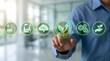 © Lee - ESG and net zero carbon emission concept with hand touching green nature icons on virtual screen,sustainable energy strategy for environmental care,eco friendly industry,climate goal.