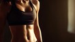 © Oleh - Woman showing strong abdominal muscles during workout