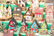 © Alessandro - Vibrant collection of handmade ceramic miniature houses displaye
