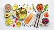 © Adnan - Healthy eating concept with salmon, salad, avocado, and fruits on white table