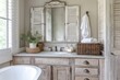 © Sanjay - A farmhouse bathroom featuring distressed wood cabinetry, whitewashed finishes, and vintage
