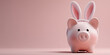© alenagurenchuk - Pink piggy bank with bunny ears on a pastel background, symbolizing spring savings, holiday finance, and gifting copy space banner