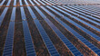 © diegorayaces - Top View of Photovoltaic Solar Panels in Large Solar Farm