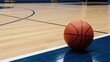 © Donnangelo - A basketball sits on the sideline of a professional basketball court with a wooden floor.