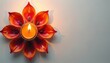 © Pete - Single burning candle in flower shaped diya. Orange yellow flame glows with warm light. Traditional Indian decor on white surface. Copy space for text.