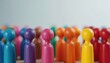 © Pete - Diverse group of colorful pawn figures stand together in rows. Figures show unity and represent varied people in a community. Concept of inclusion and teamwork is evident in the gathering.