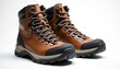 © Pete - Pair of sturdy brown leather hiking boots with black accents and thick lug soles. These rugged boots feature durable laces and are designed for outdoor adventures and difficult terrain.