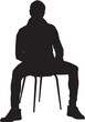 © Curto - vector; silhouette of front view of a cool man sitting on chair looking at camera