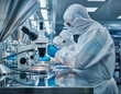© Sac ro jobh - Pharmaceutical Cleanroom Technicians Working with Precision Instruments
