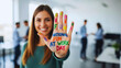 © Sanjaya - National Fun at Work Day Message Written on Young Employee Hand Promoting Joyful Workplace Culture