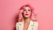© Oleksandr - A portrait of a pretty woman with stunning pink hair is set against a rosy backdrop, showcasing her vibrant style and her captivating gaze pointed upwards. Her jacket adds a touch of elegance.