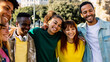© Xavier Lorenzo - Happy diverse group of millennial students and best friends enjoying time together outdoors on a sunny day, laughing and bonding at the city street. Youth, friendship, and positive lifestyle concept.