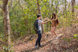 © Rakchanok - Asian lovers male and female walking hiking together in the forest park happy exercise outdoors activity, happy couple dating one day backpack trip travel in summer day vacation bonding relationship