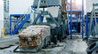 © Parilov - Industrial paper recycling pressed block, baling equipment in modern waste management facility
