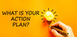 © Dzmitry - What is your action plan symbol. Concept words What is your action plan on beautiful paper. Beautiful orange background. Businessman's hand. Business what is your action plan concept. Copy space.