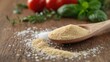 © Seyyar - Dry yeast with oregano, salt, pepper, and tomato on a spoon, essential for artisan pizza making, food handling