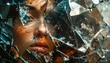 © Juri_Tichonow - Close up portrait of womans face seen through shattered glass shards with golden light and sharp reflections