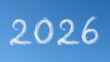 © Enigma - Year 2026 clouds forming calendar numbers against a clear blue sky, concept of future and optimism