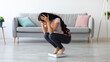 © Prostock-studio - Young Indian woman sitting on scales, upset over weight gain at home, copy space. Emotional Eastern woman dissatisfied with slimming results, fighting excess kilograms, panorama