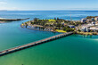 © Austockphoto - A sweeping aerial view of Wallis Lake and the town of Forster
