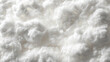 © Pachara - Soft white cotton fiber texture with fluffy cloudlike tufts creating soft cozy feeling and delicate detail in close up